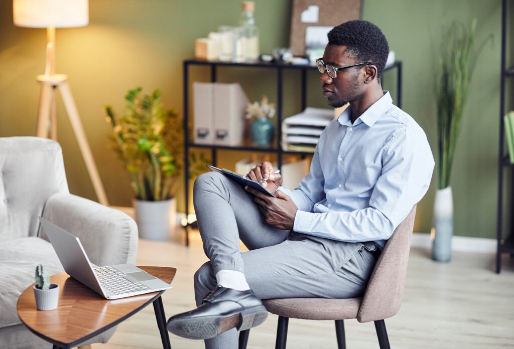 Focused man learning about the benefits of problem-solving